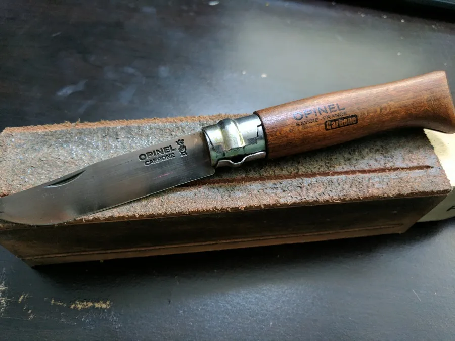 Opinel No.8 folding knife open after the handle treatment