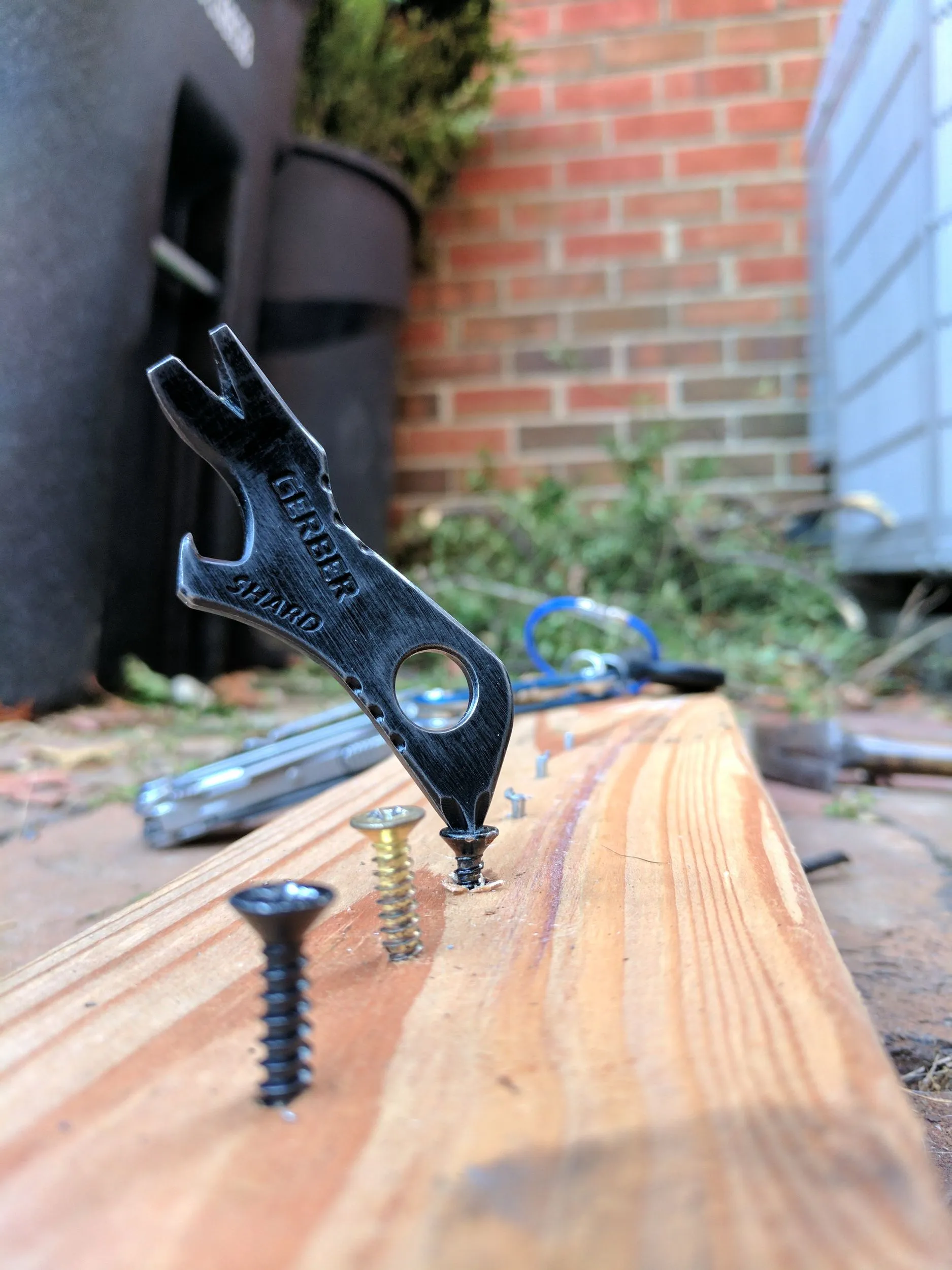 Gerber Shard held in hand showing its compact keychain size
