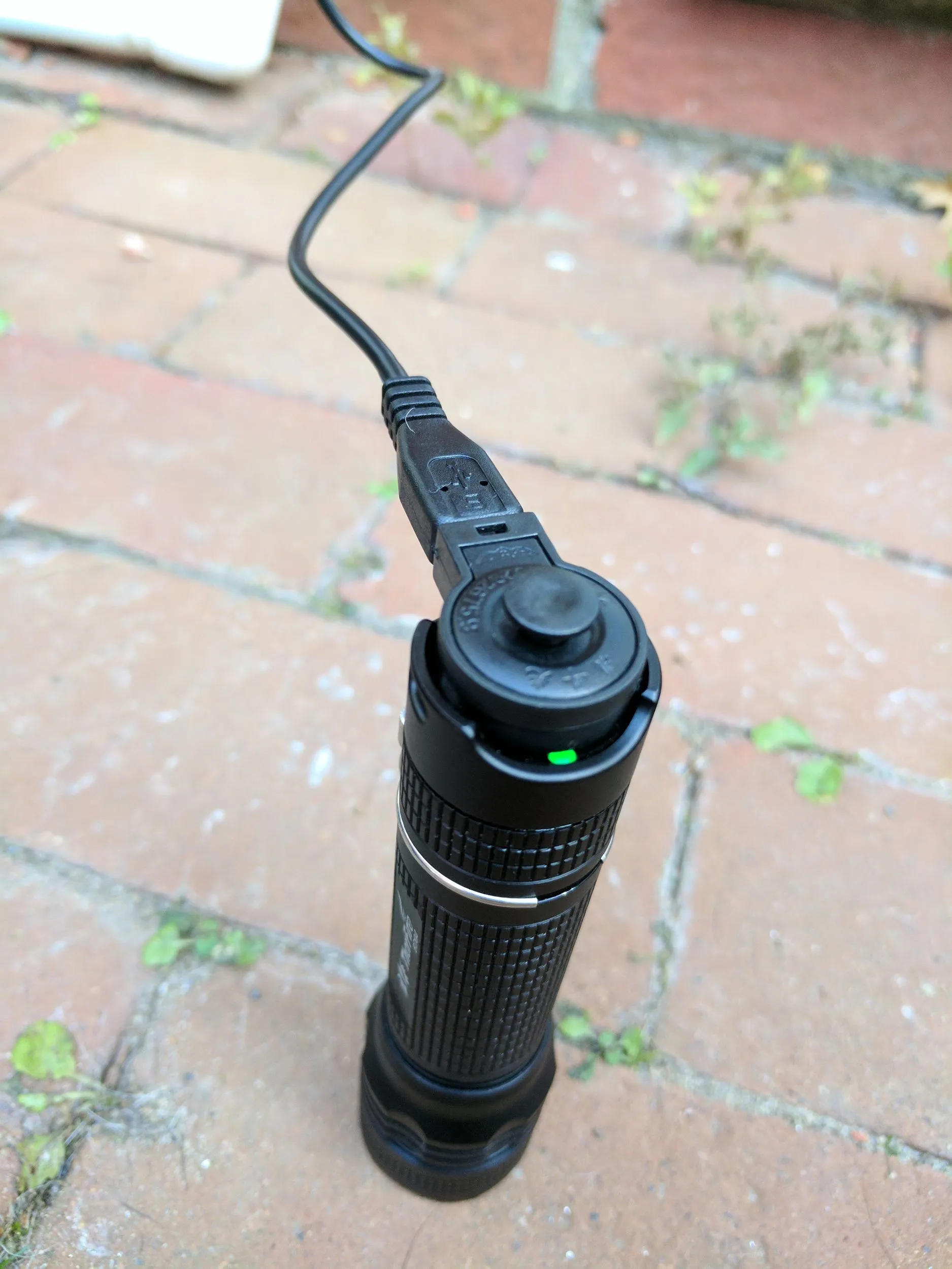 ThorFire BD05 flashlight head and bezel close-up