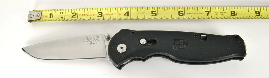SOG Flash II folding knife clipped in a pocket