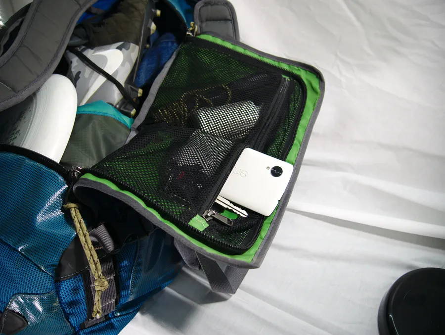 Two mesh pockets on the duffel's top flap